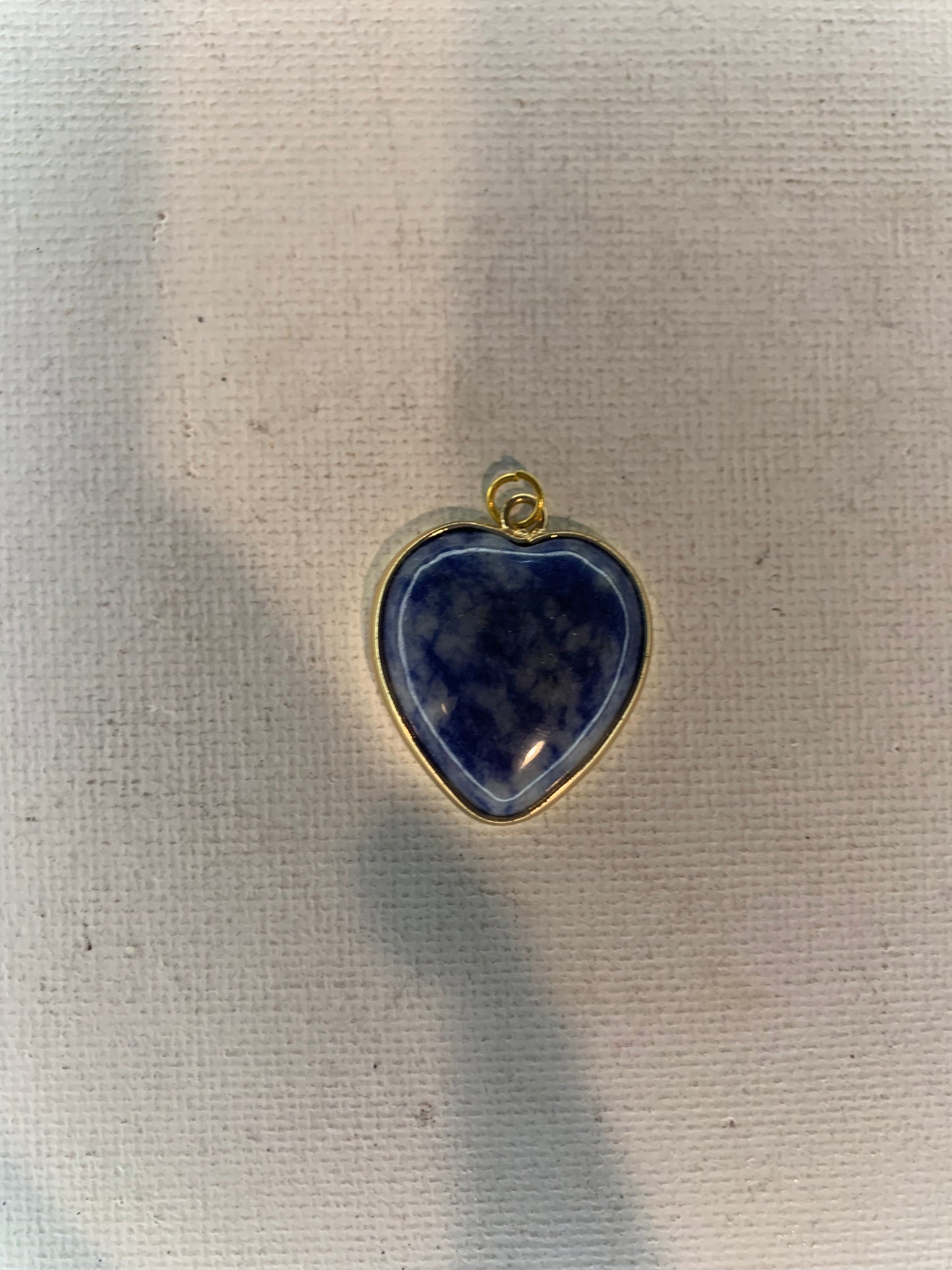 Sodalite pendant  in gold.