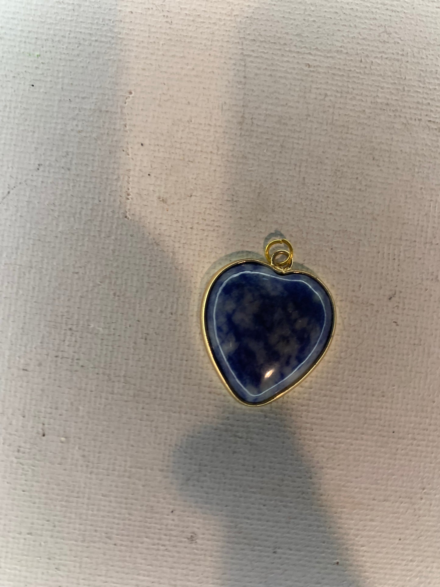 Sodalite pendant  in gold.