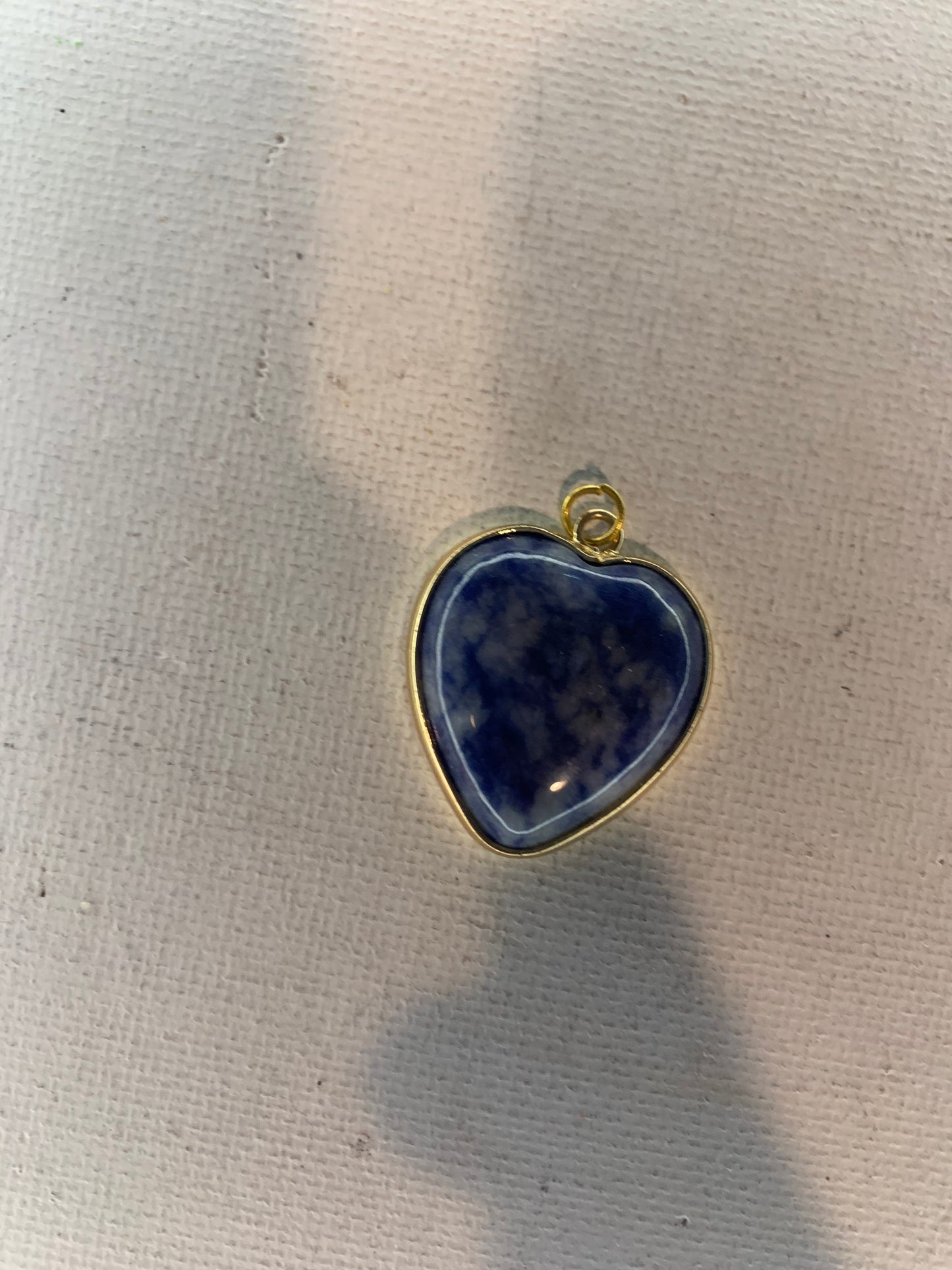 Sodalite pendant  in gold.