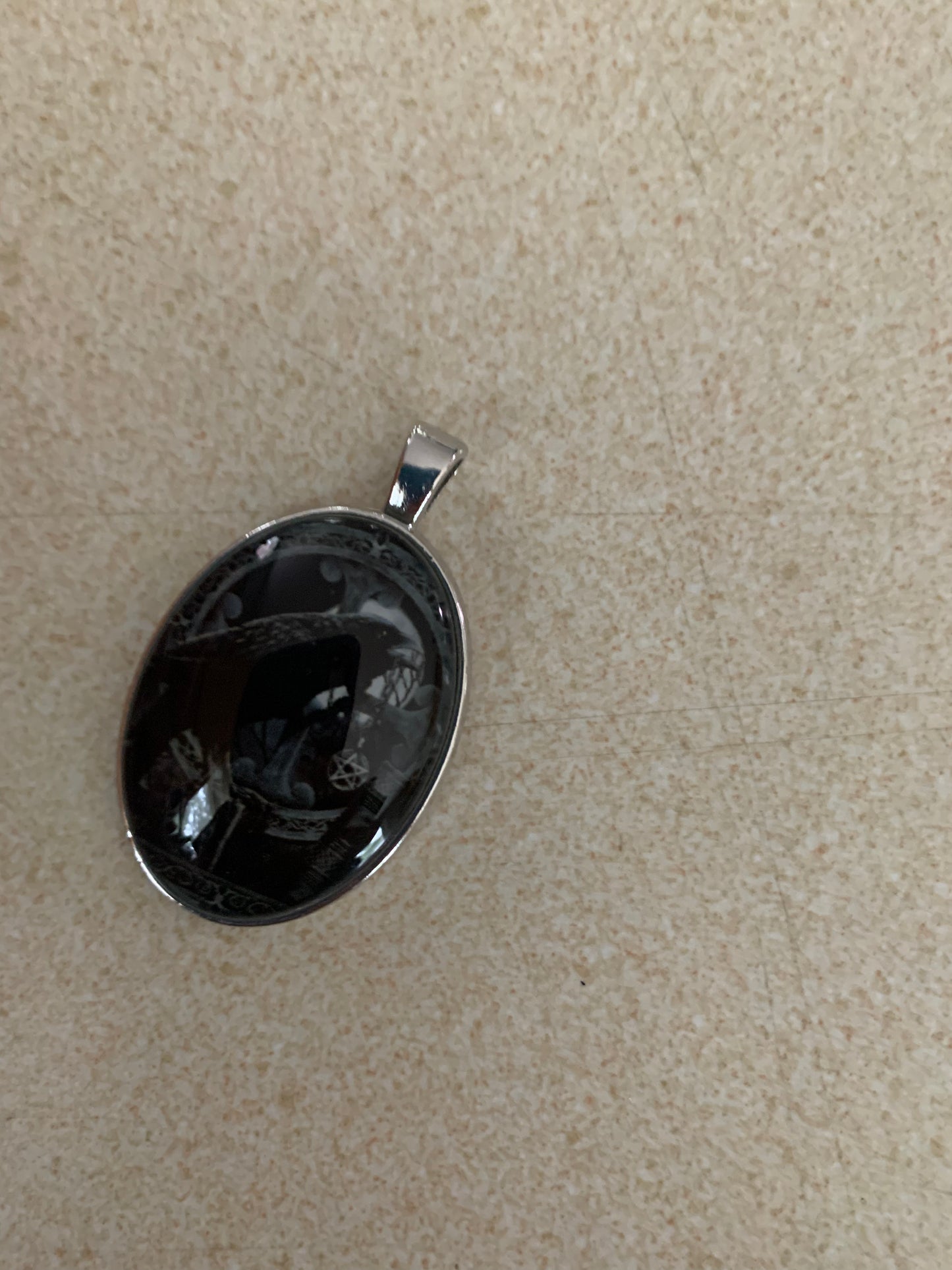 Simple Black Crown Pendant