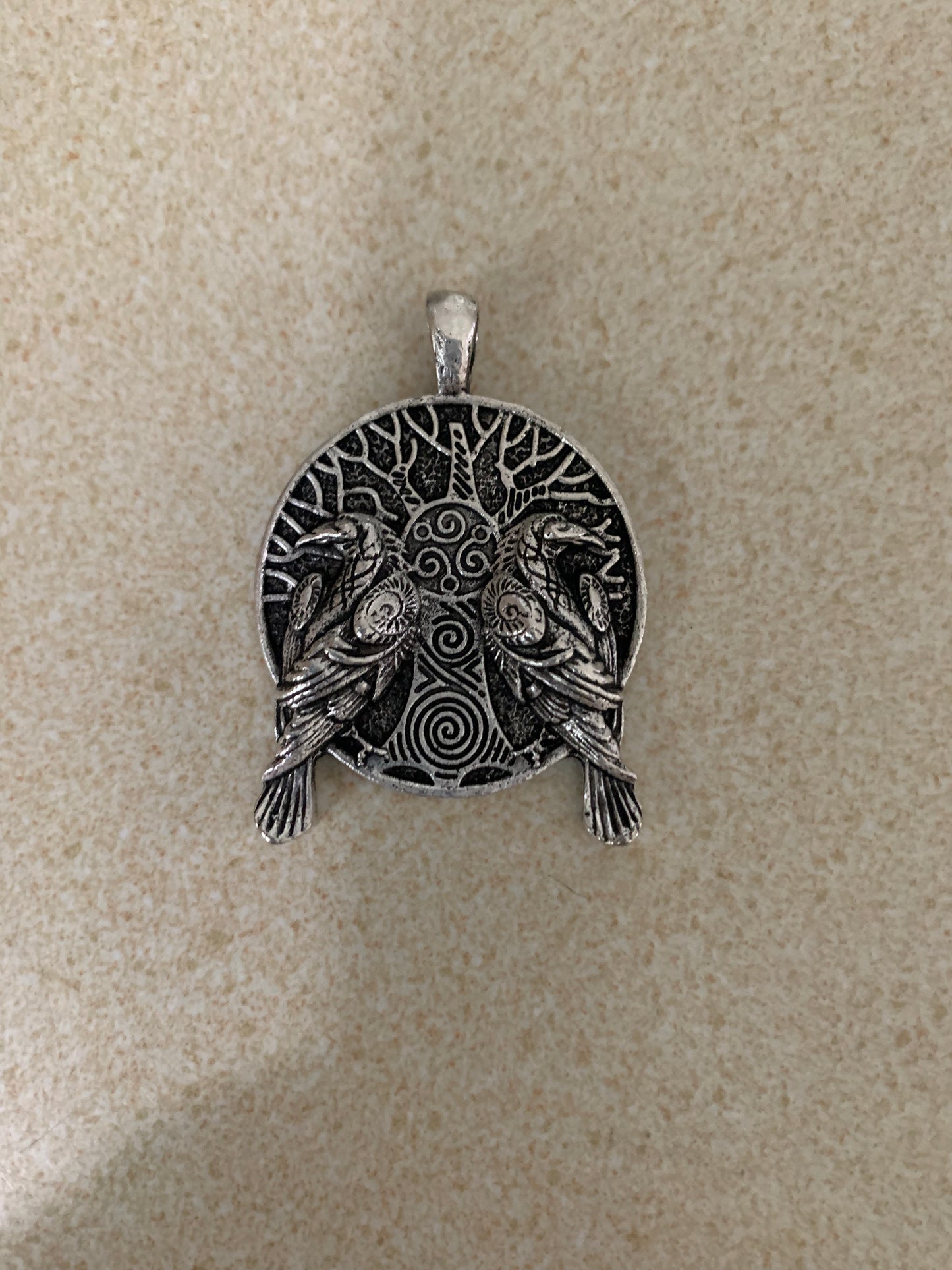 Two crow pendant